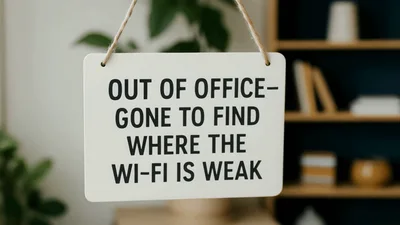 Out Of Office Sign Hanging In A Home Office
