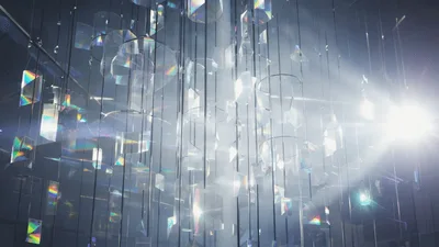 Hanging Prismatic Glass Chandelier Reflecting Bright Light