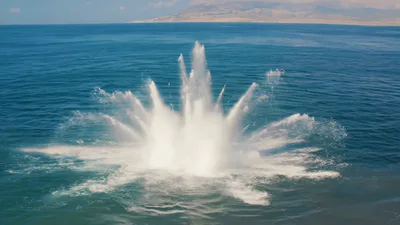 Large Underwater Explosion Creating Massive Water Splash