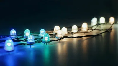 Colorful LED String Lights Glowing on Dark Surface