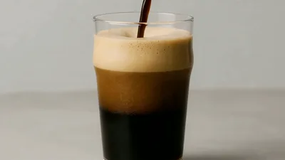 Nitro Cold Brew Coffee Pouring Into Glass