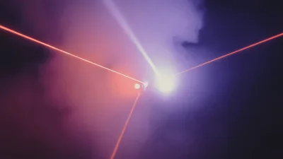 Stage Lighting Lasers Beams In Smoky Atmosphere