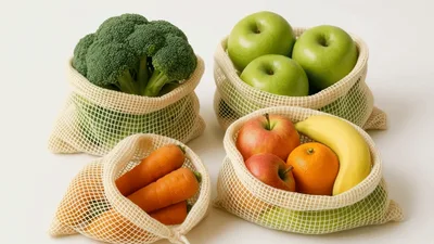 Fresh Vegetables And Fruits In Reusable Mesh Produce Bags