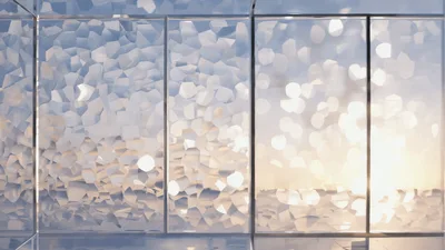 Abstract Geometric Glass Panels Reflecting Golden Sunset Light