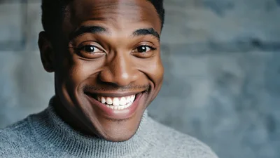 Portrait Of A Smiling Young African American Man