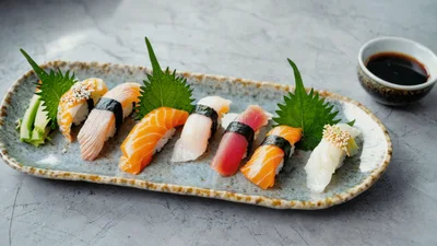 Assorted Nigiri Sushi Platter On A Textured Plate