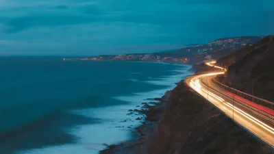 Coastal Highway Traffic Light Trails At Twilight