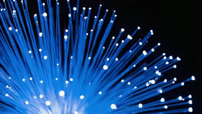 Glowing Blue Fiber Optic Light Strands Radiating
