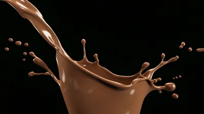 Liquid Chocolate Pouring Creating A Dynamic Splash