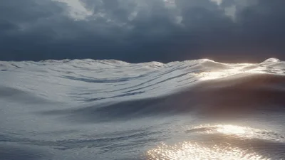 Calm Ocean Waves Rolling Under Dark Stormy Sky
