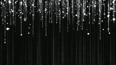 Falling Silver Glitter Particles On Black Background