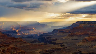 Dramatic Sunbeams Over The Grand Canyon At Sunset