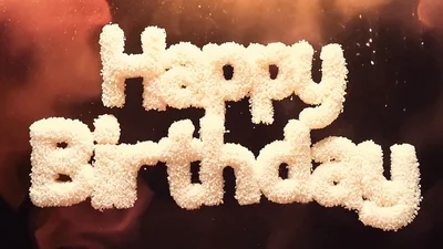 Happy Birthday Text Formed By White Particles
