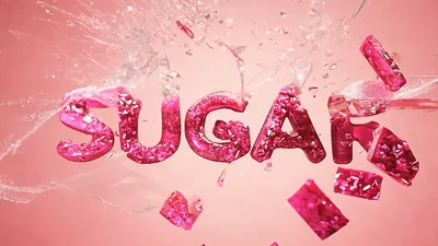 Pink Sugar Text Shattering Into Crystal Fragments