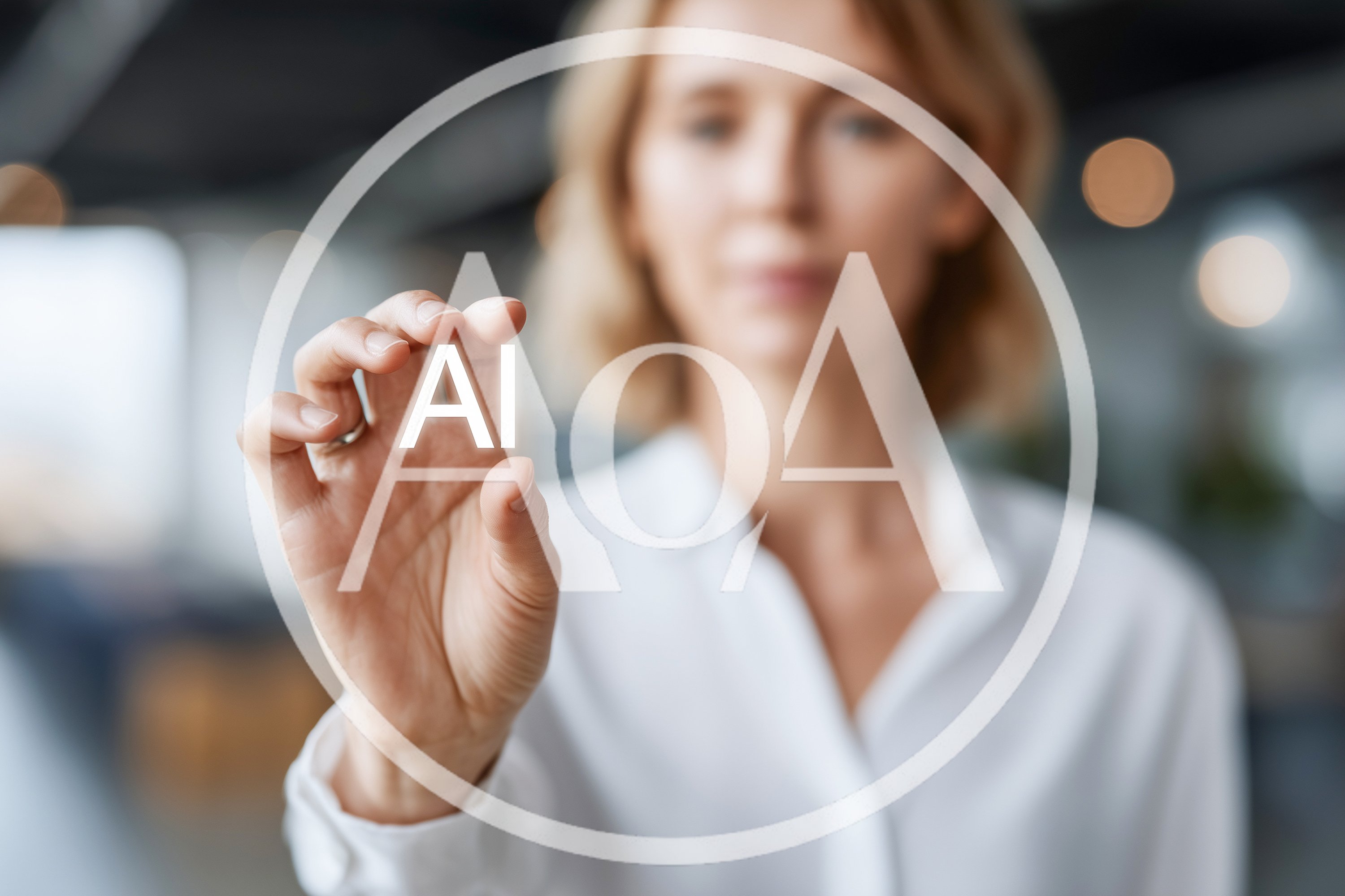 Businesswoman Holding Floating AI Text In Office