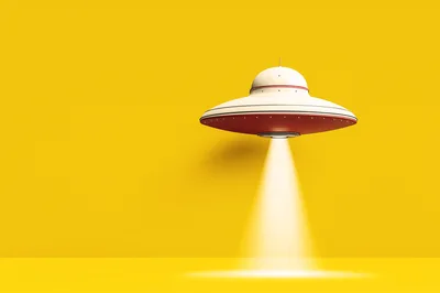 White And Red UFO Hovering Against Yellow Background