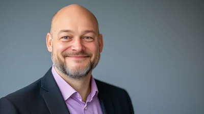 Portrait Of A Smiling Middle Aged Businessman
