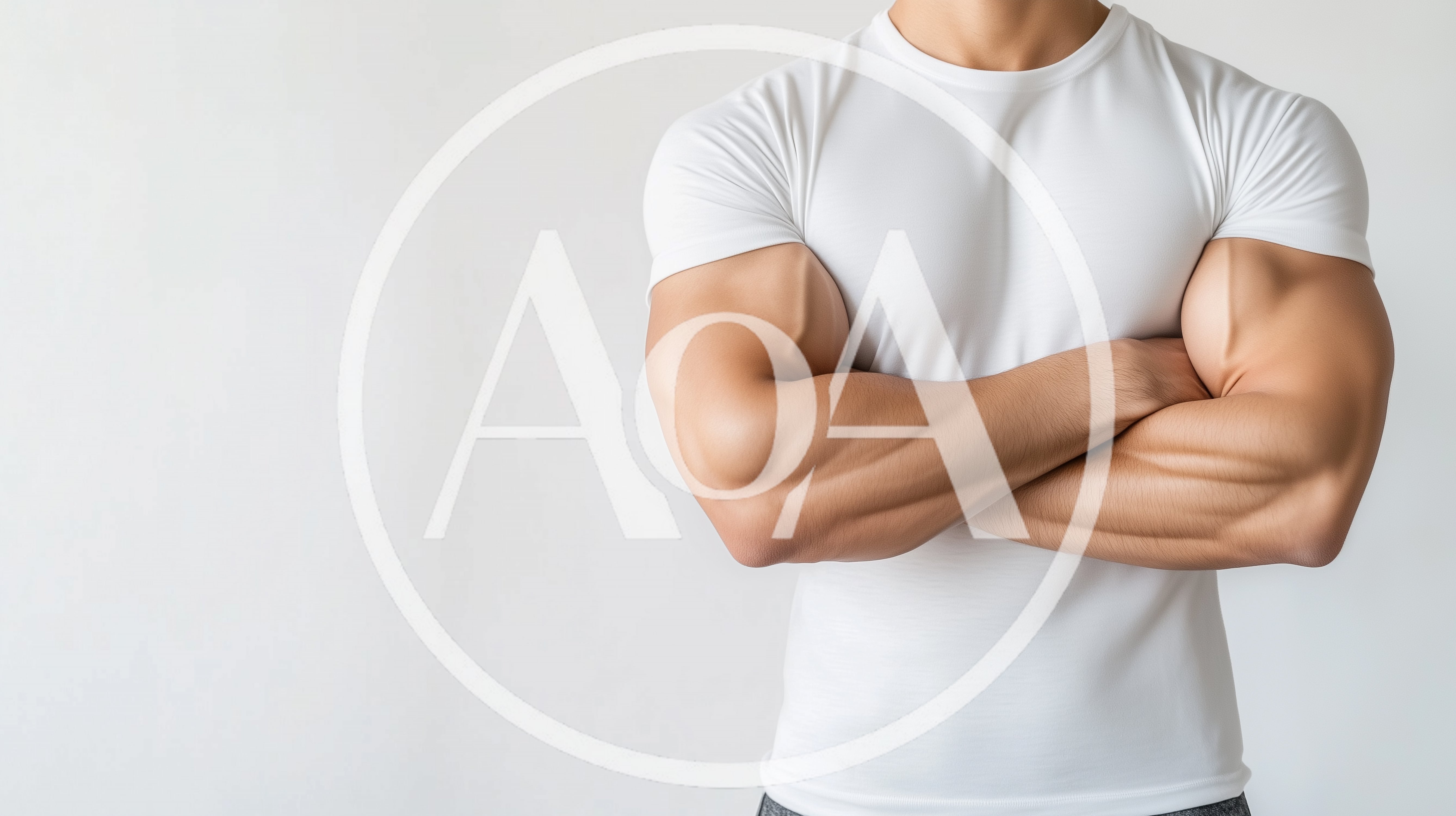 Muscular Man With Crossed Arms In White T-Shirt