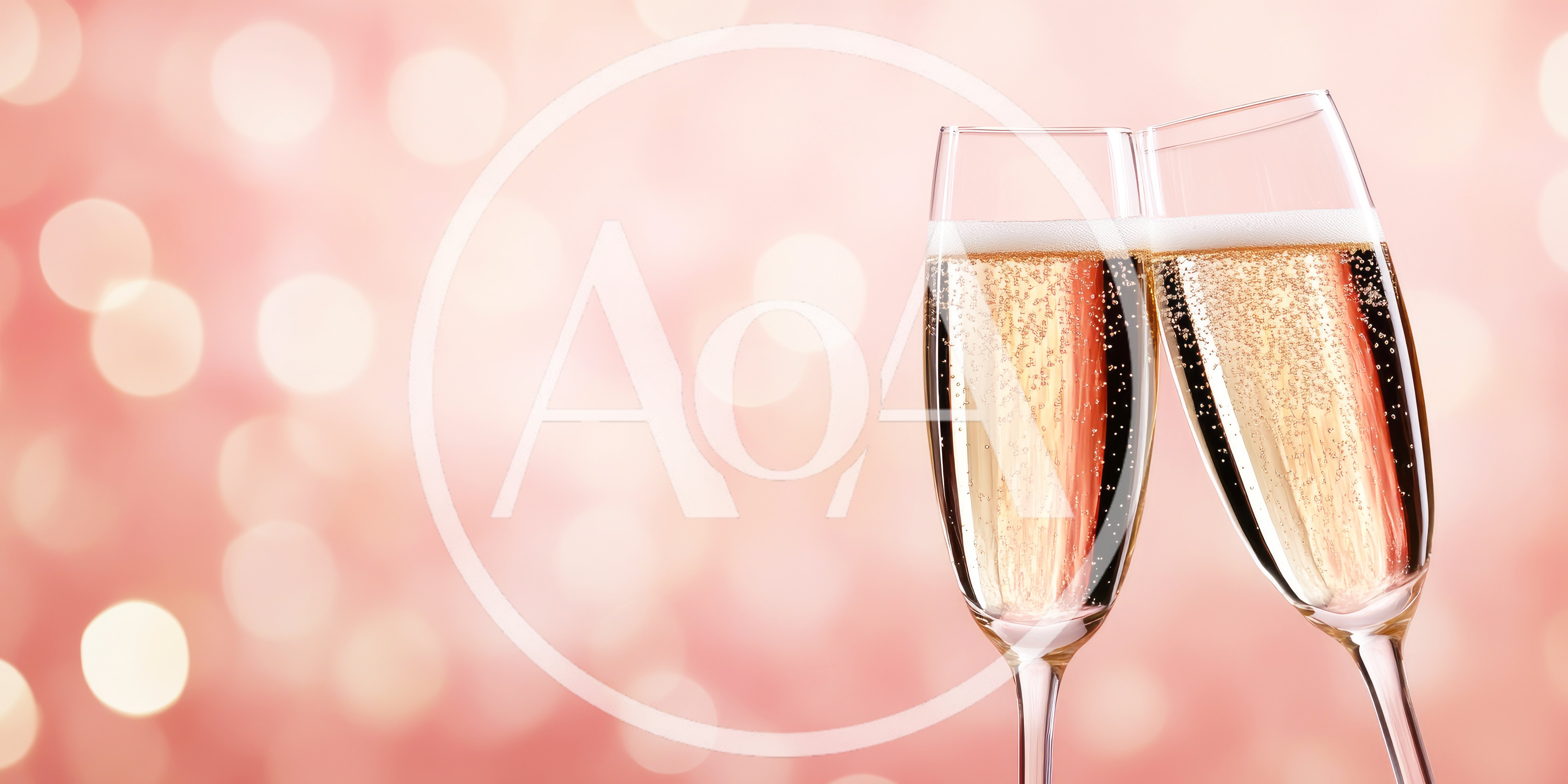 Two Champagne Flutes Toasting Against A Pink Bokeh Background