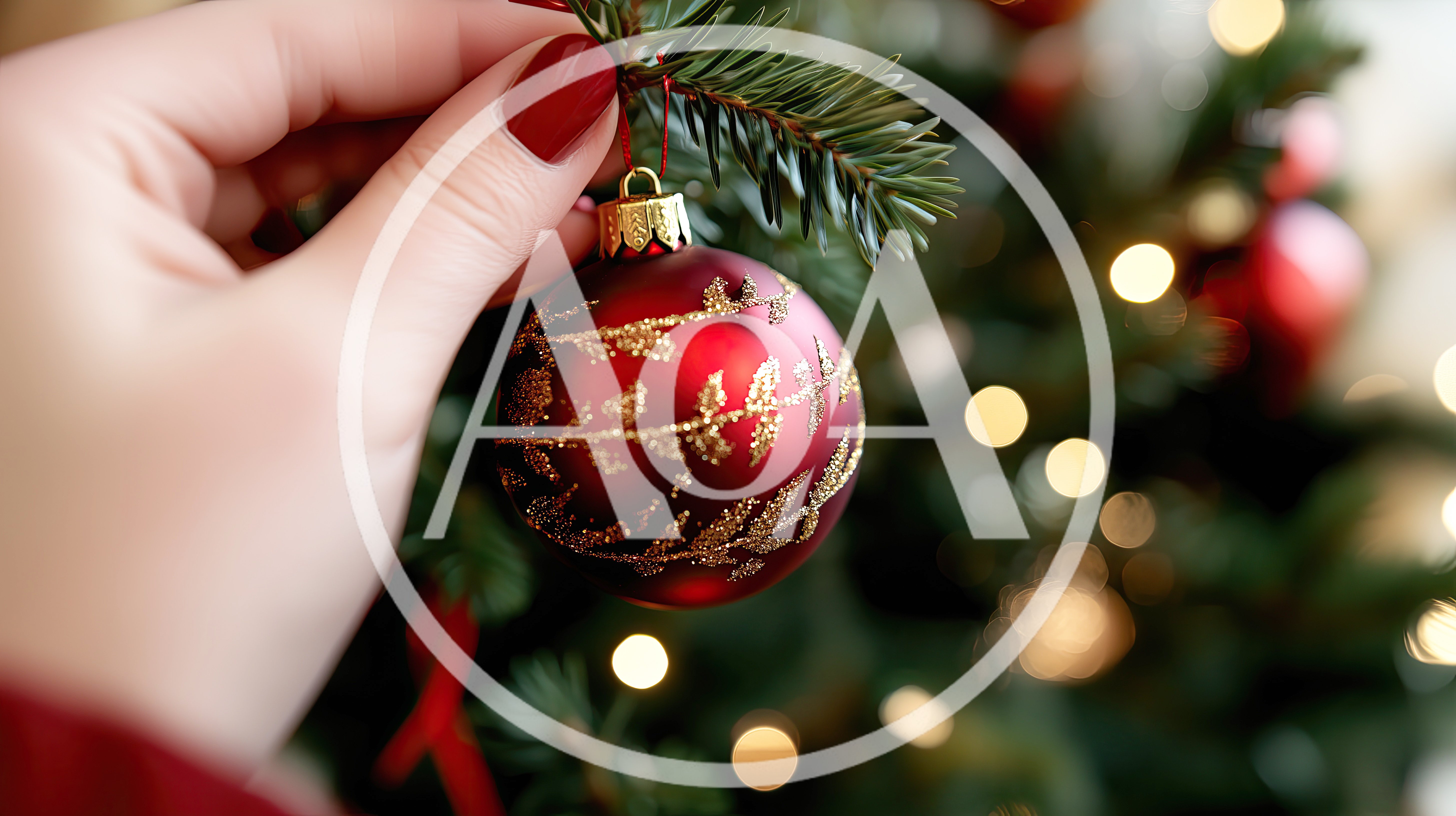 Hand Placing Red Christmas Ornament On Tree