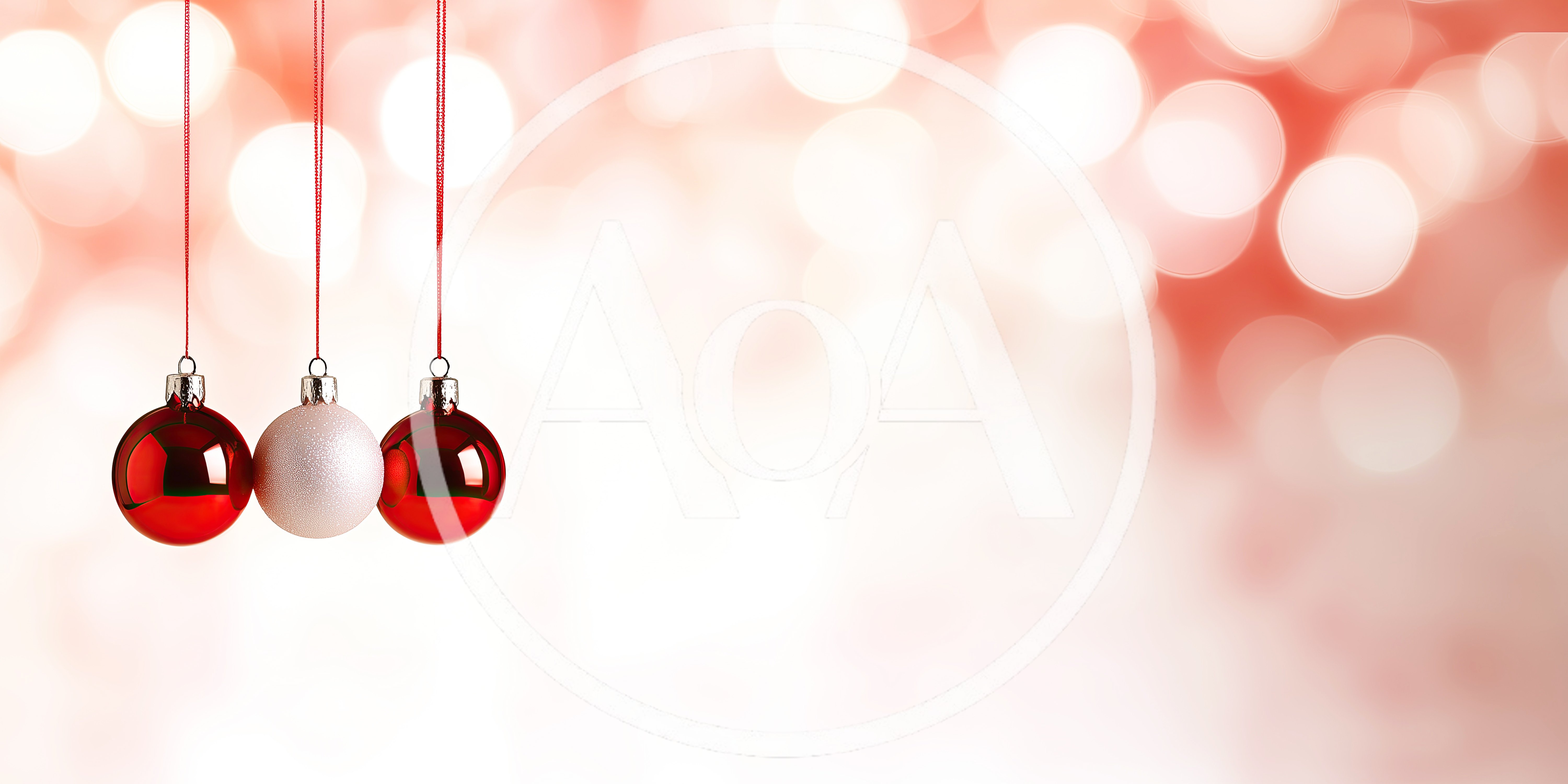 Three Christmas Ornaments Hanging Against Blurred Red Background