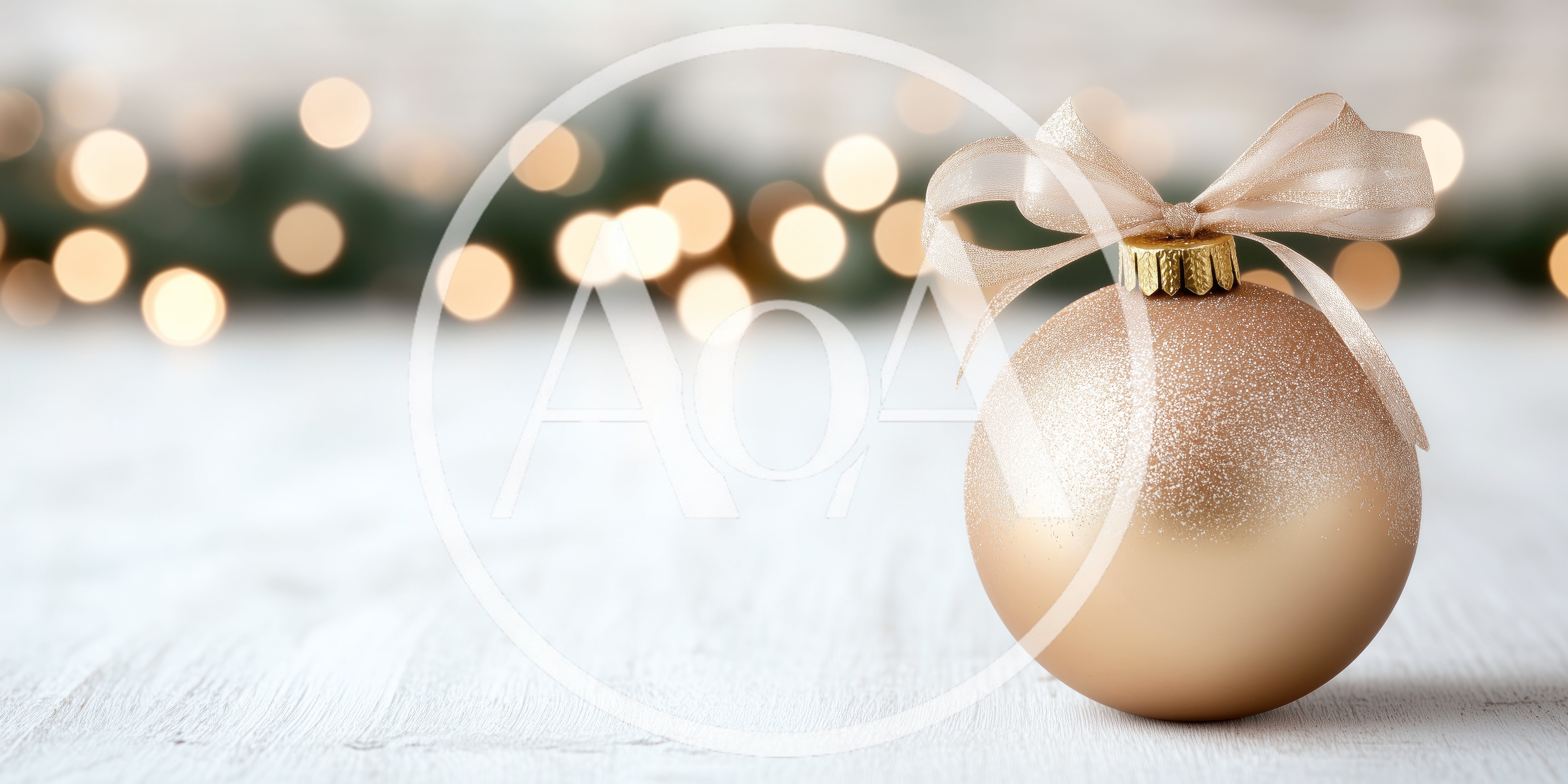 Golden Christmas Ornament With Ribbon On White Wood
