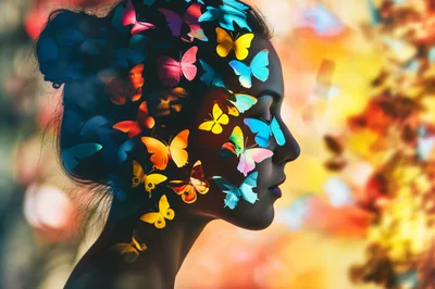 Surreal Portrait Of Woman With Colorful Butterflies