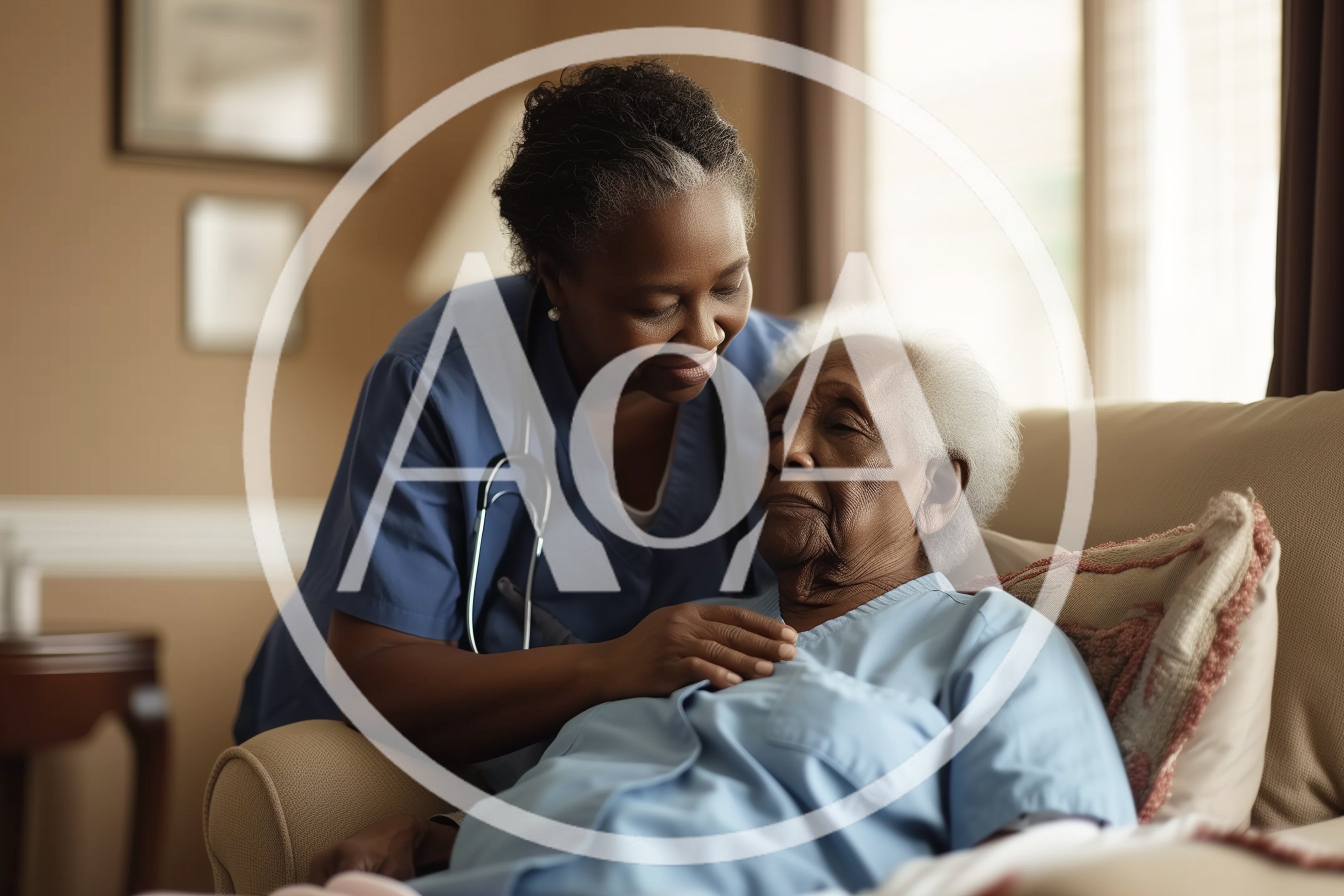 Caregiver Comforting An Elderly Patient At Home
