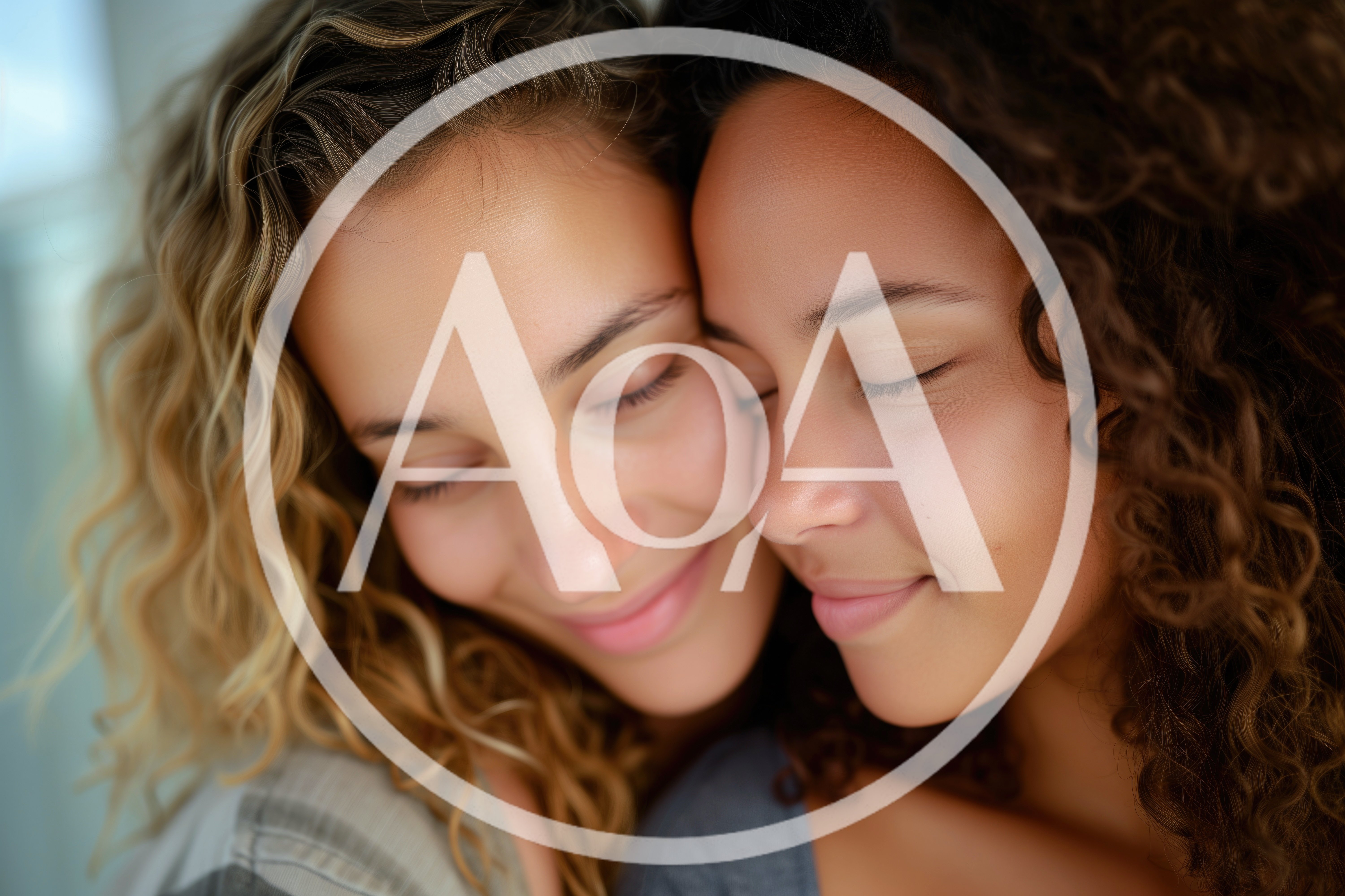Two Young Women Embracing With Eyes Closed