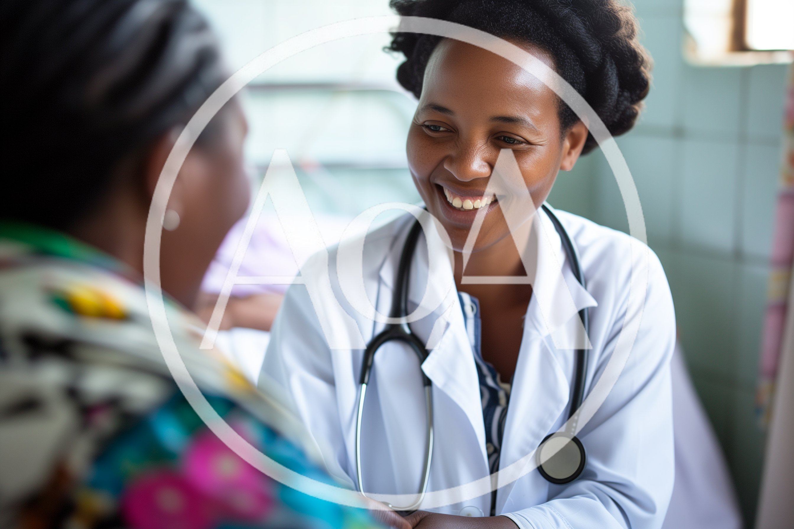 Female Doctor Consulting With Patient In Hospital Room