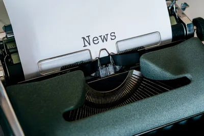 Vintage Typewriter Typing The Word News On Paper
