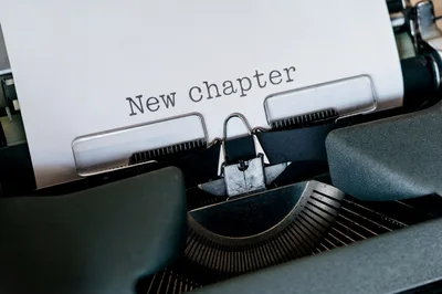 Vintage Typewriter Typing New Chapter On Paper