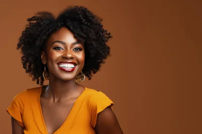 Portrait Of A Smiling Woman With Curly Hair