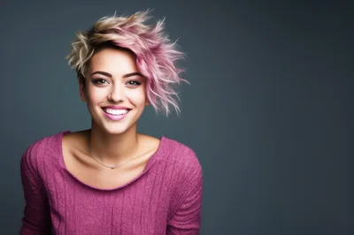 Portrait Of A Smiling Woman With Pink Highlights
