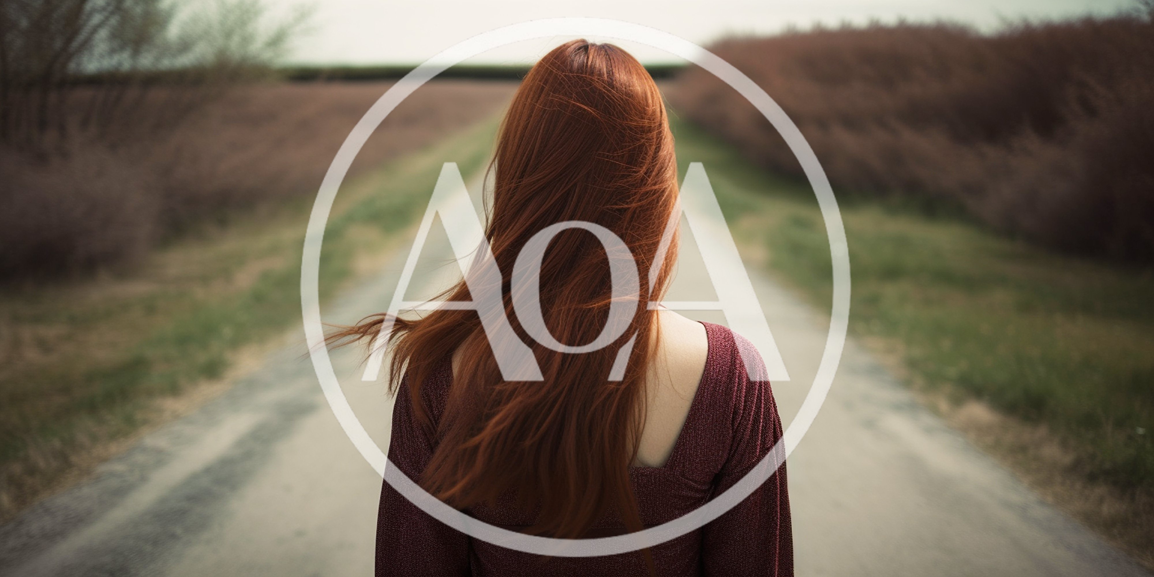 Woman With Long Red Hair Walking Down Country Road