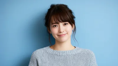 Portrait Of A Smiling Young Japanese Woman