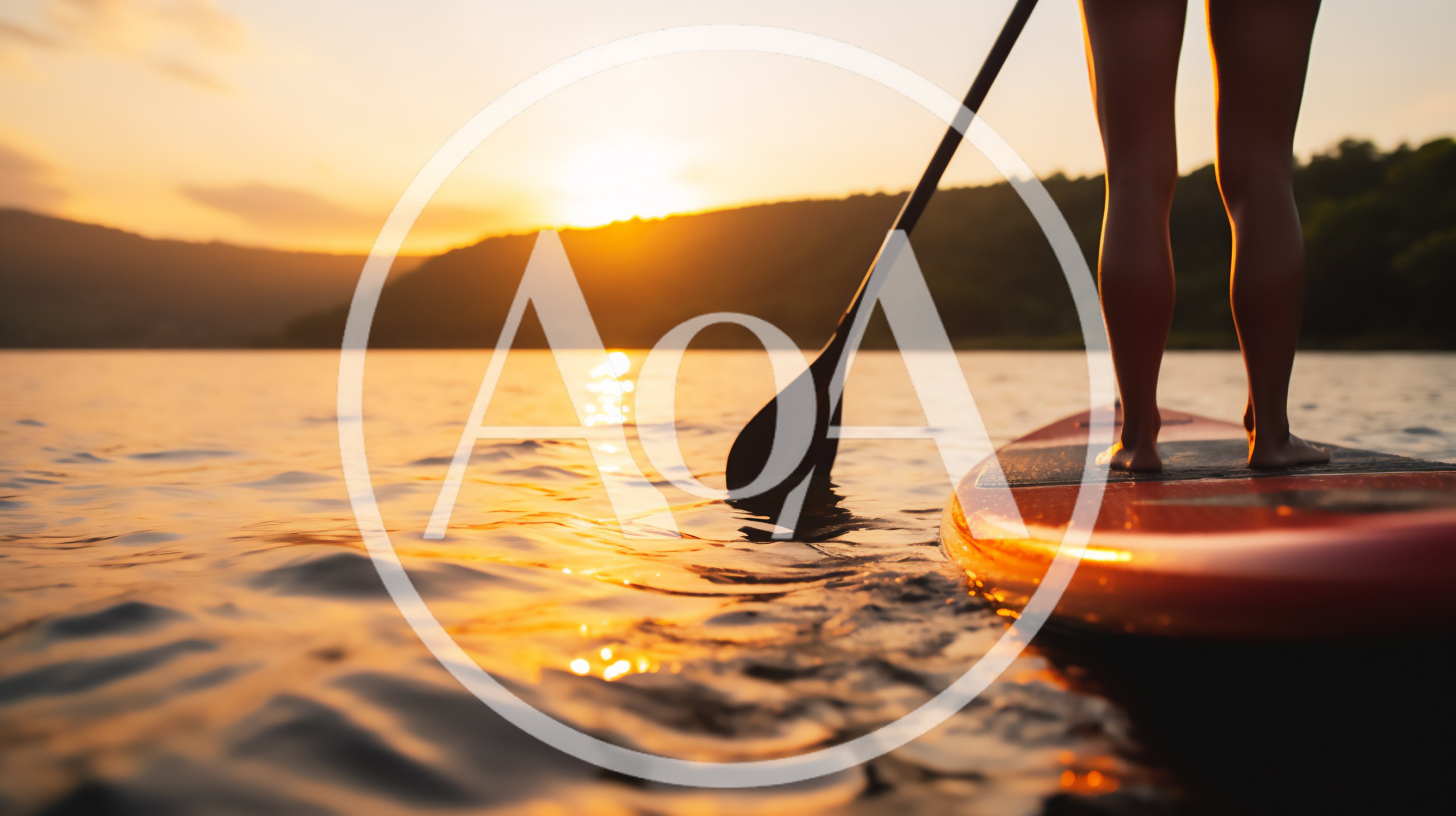 Person Paddleboarding On A Lake At Sunset