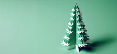 Minimalist Paper Craft Christmas Tree on Green Background