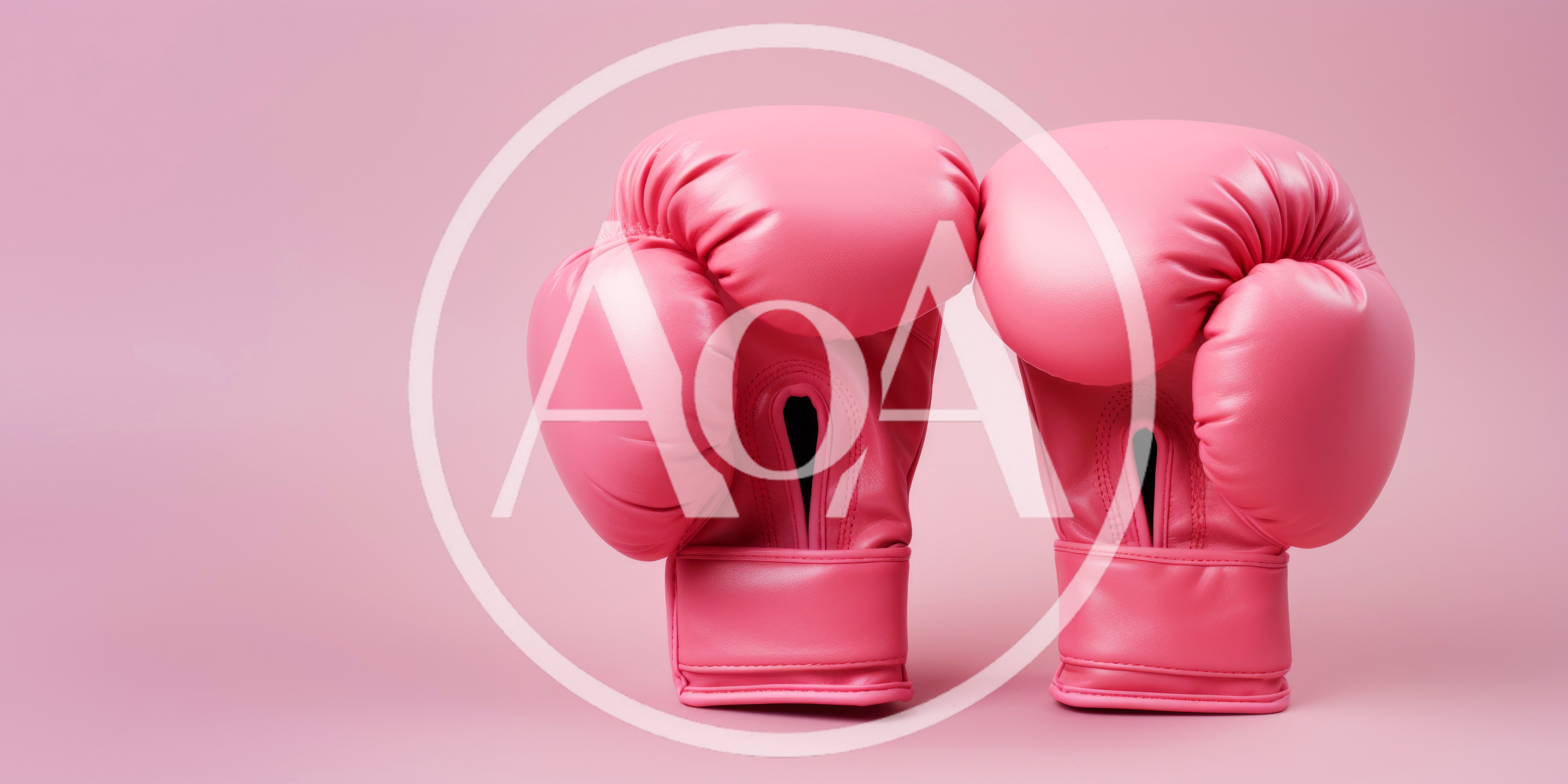 Pair Of Pink Boxing Gloves On Pink Background