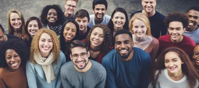 Diverse Group of Young Adults Smiling at Camera