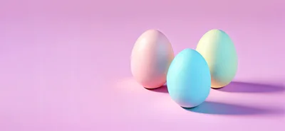 Three Pastel Easter Eggs On Pink Background
