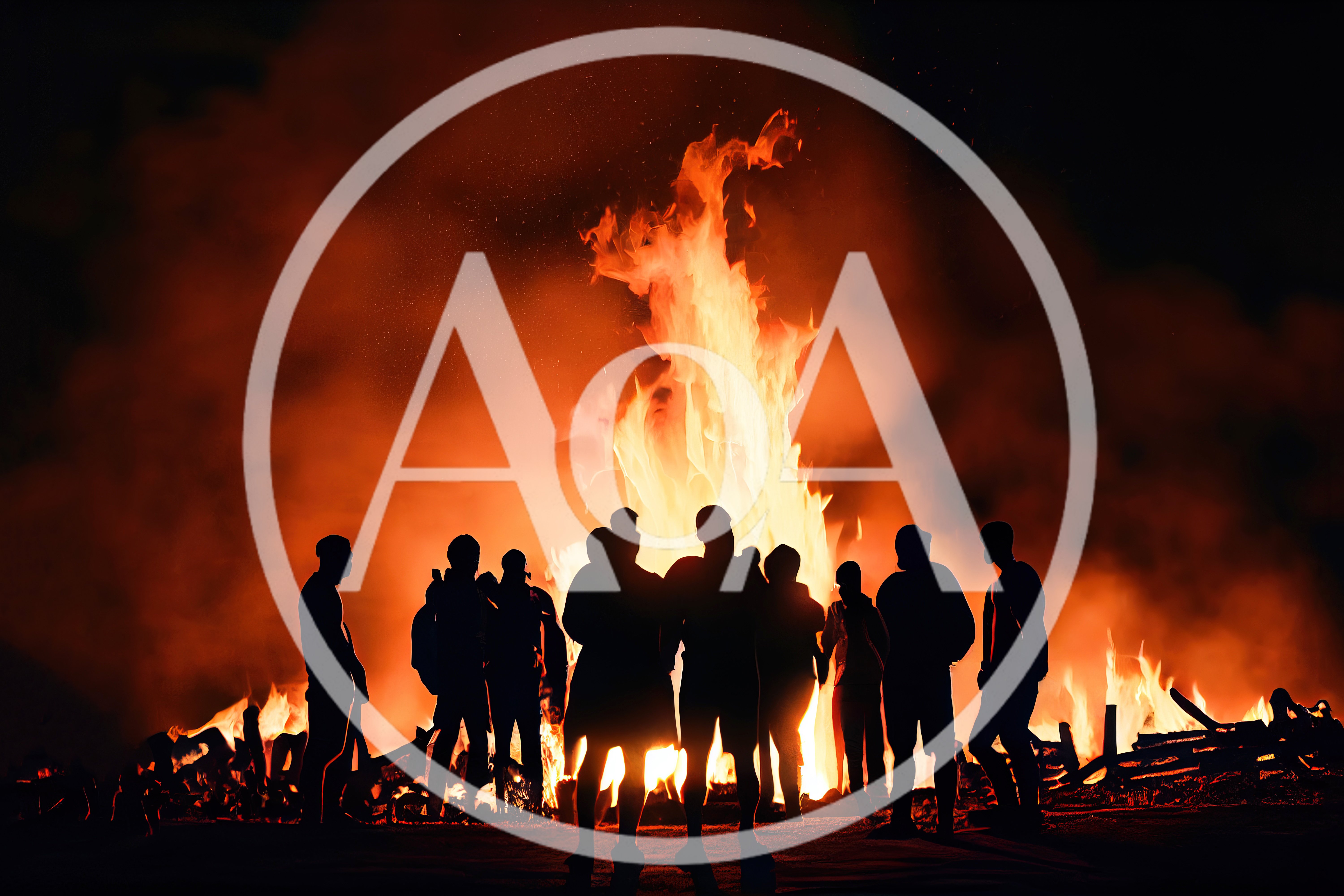 Silhouetted Group Standing Before A Large Bonfire