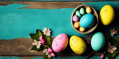 Easter Eggs Arranged on Rustic Teal Wooden Background