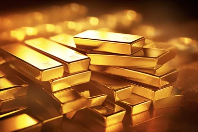 Stack Of Shiny Gold Bars In Warm Lighting