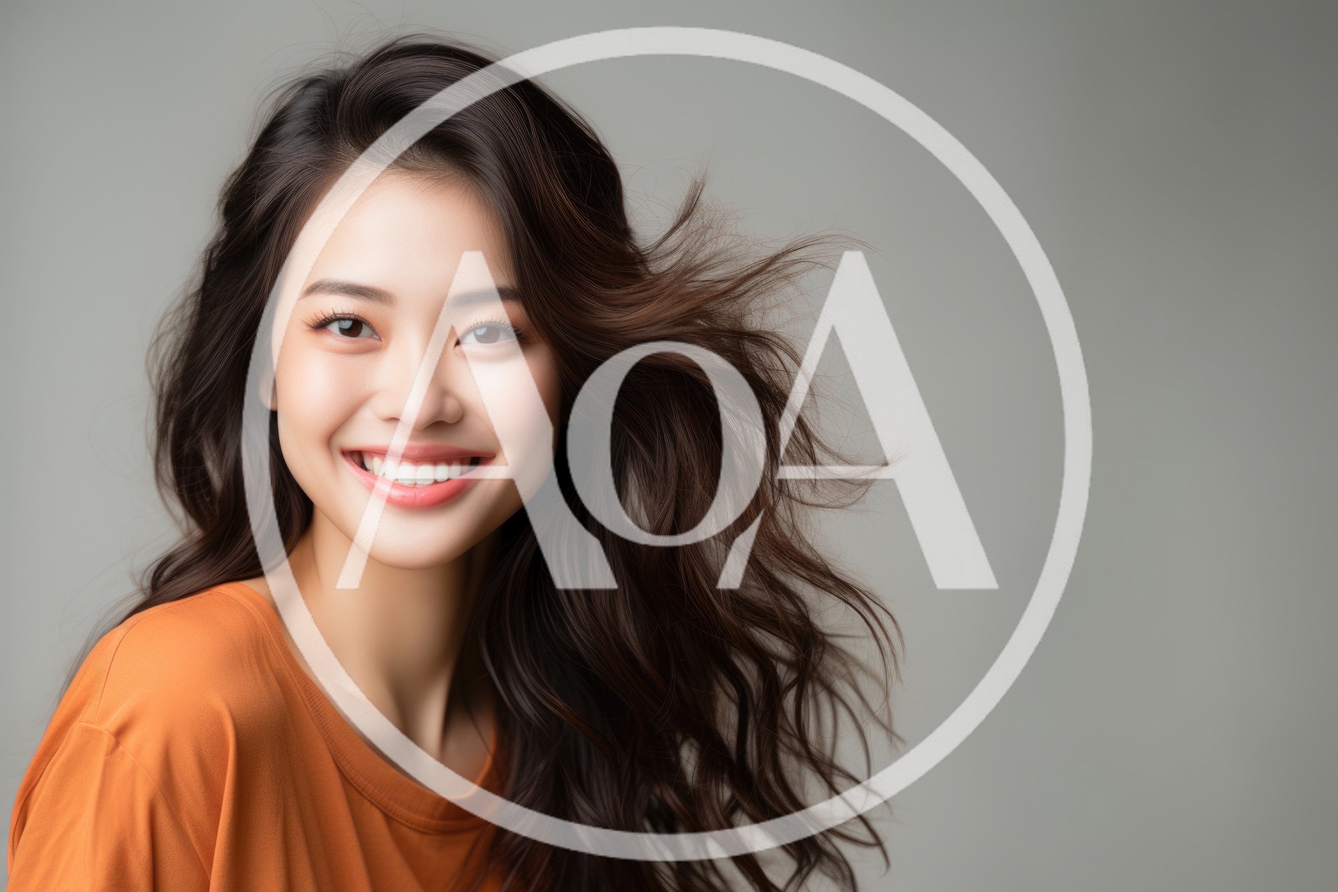 Portrait Of A Smiling Young Asian Woman