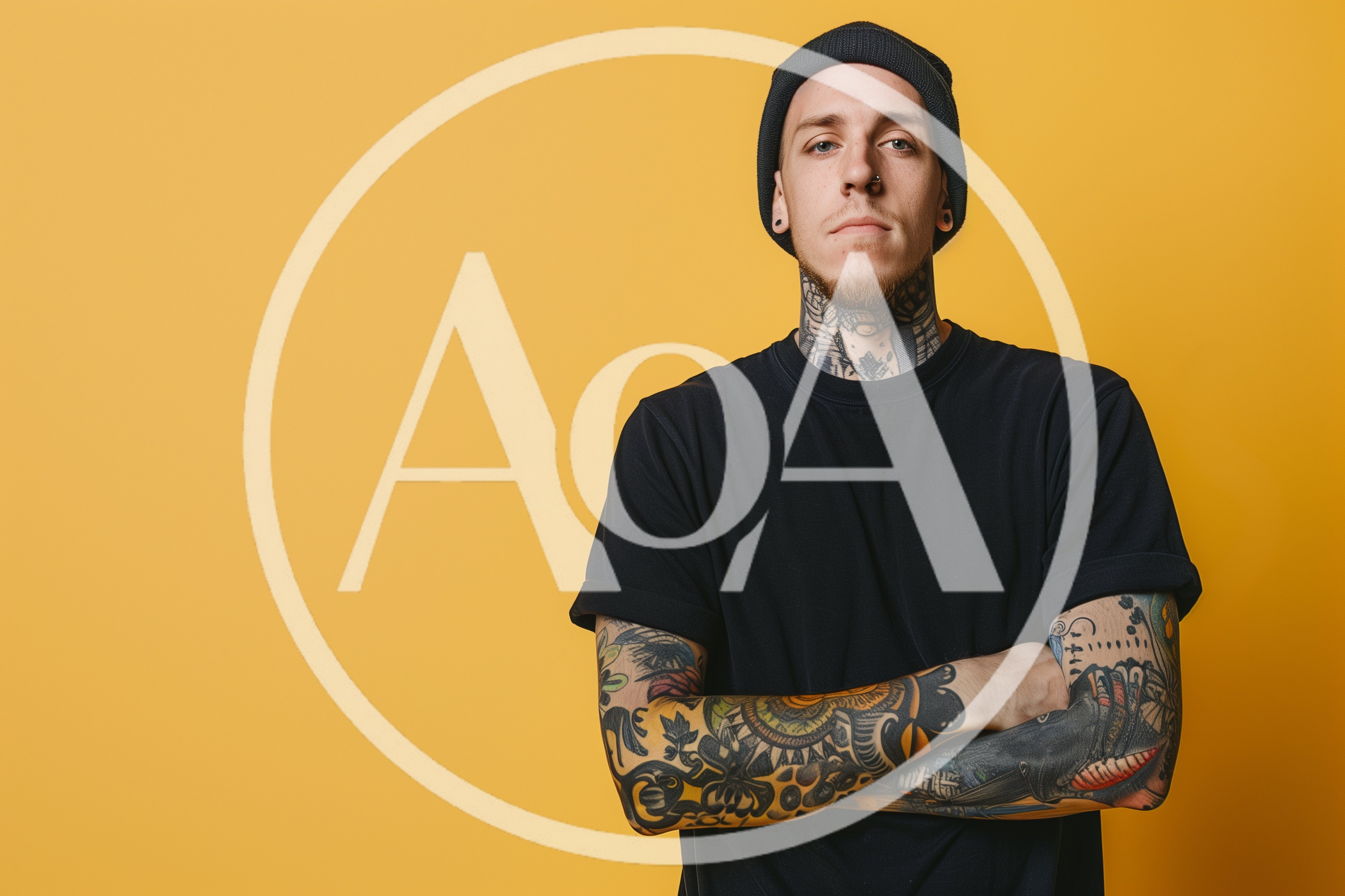 Young Man With Tattoos And Beanie Posing