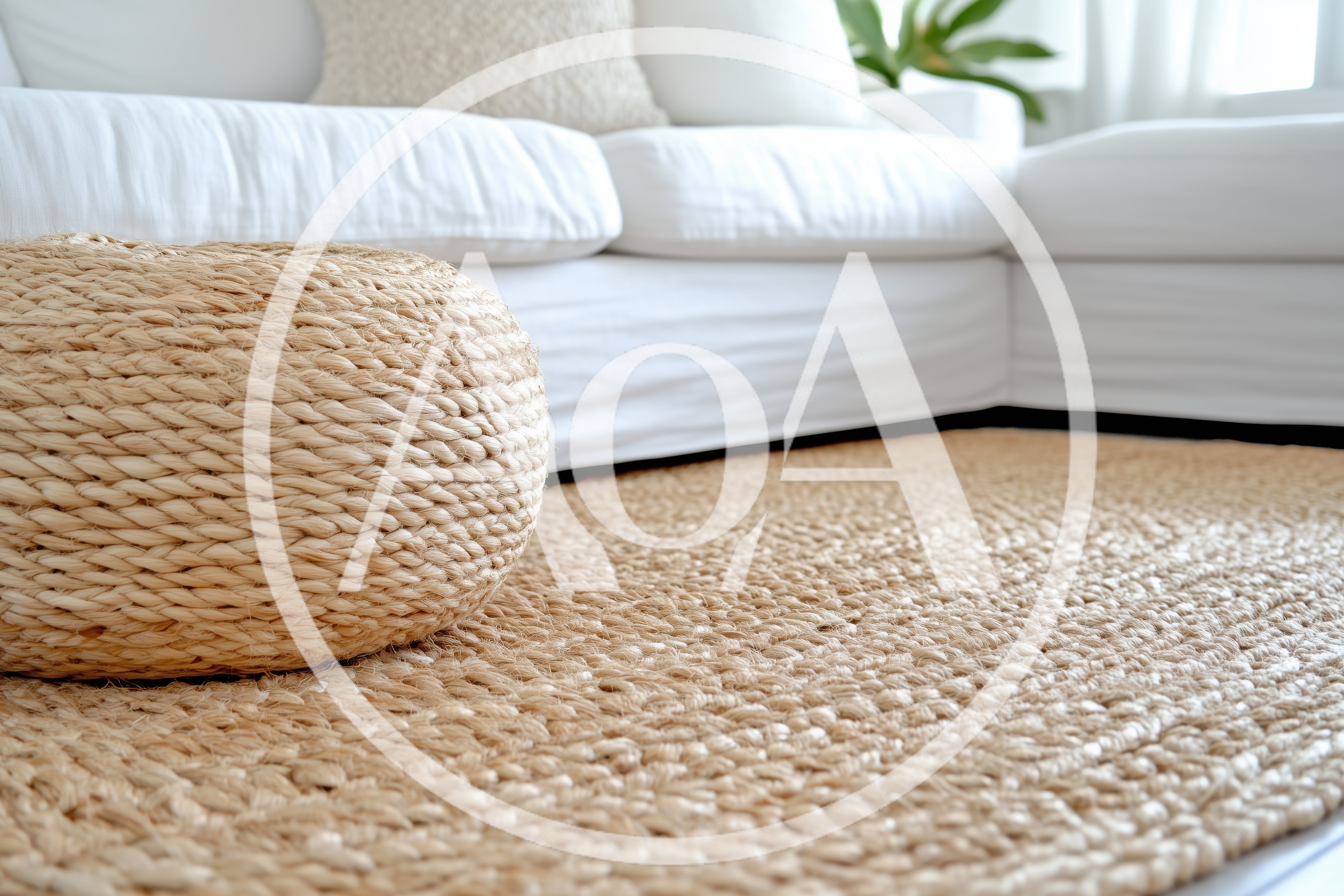 Woven Jute Ottoman And Area Rug In Living Room