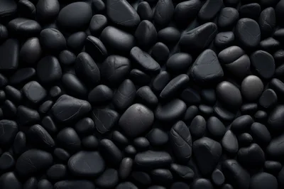 Top View Of Smooth Polished Black River Stones