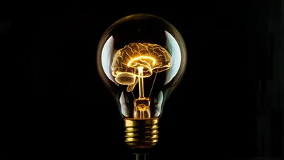 Glowing Digital Brain Inside A Light Bulb
