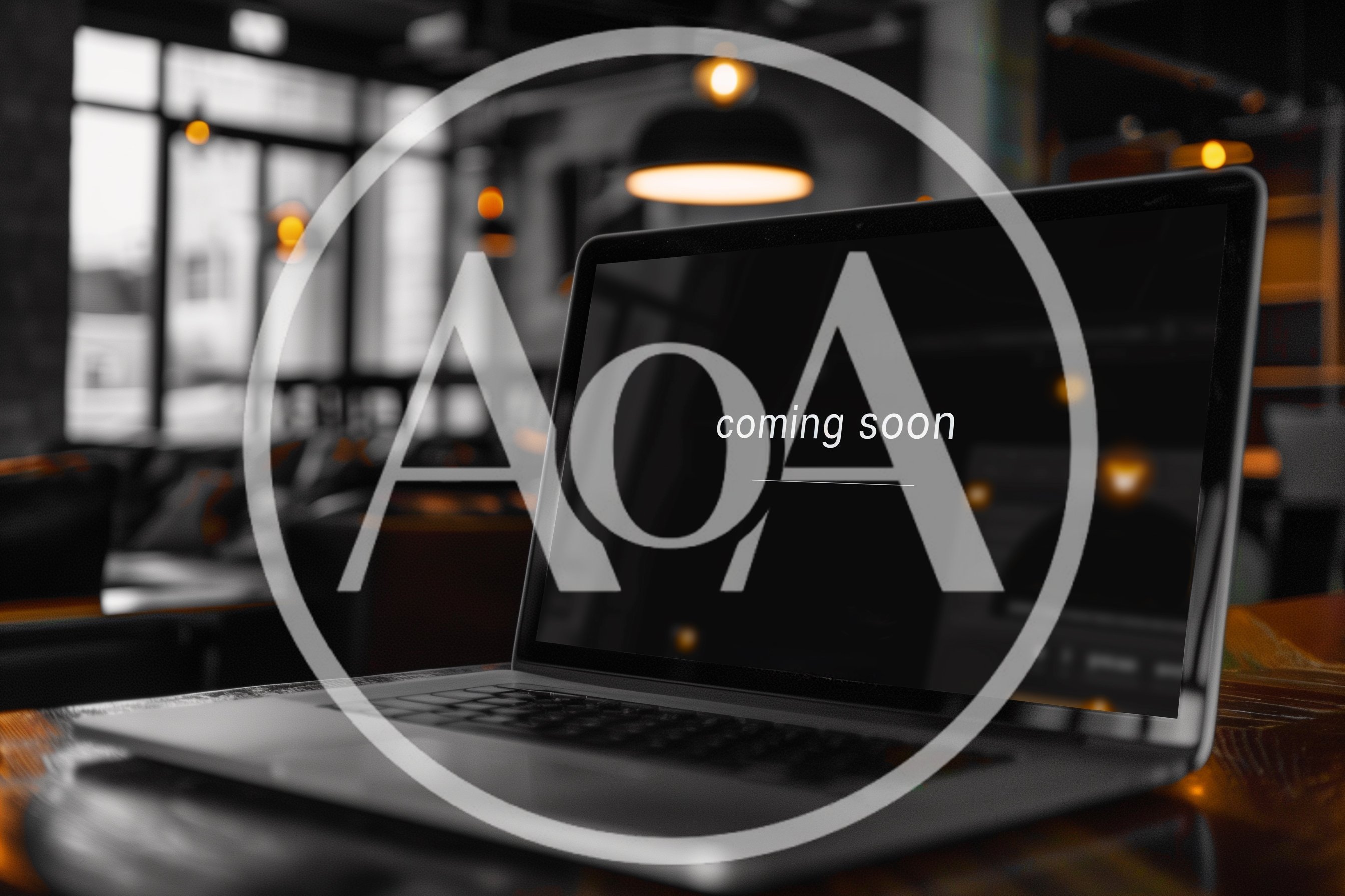 Laptop Displaying Coming Soon Text In A Cafe
